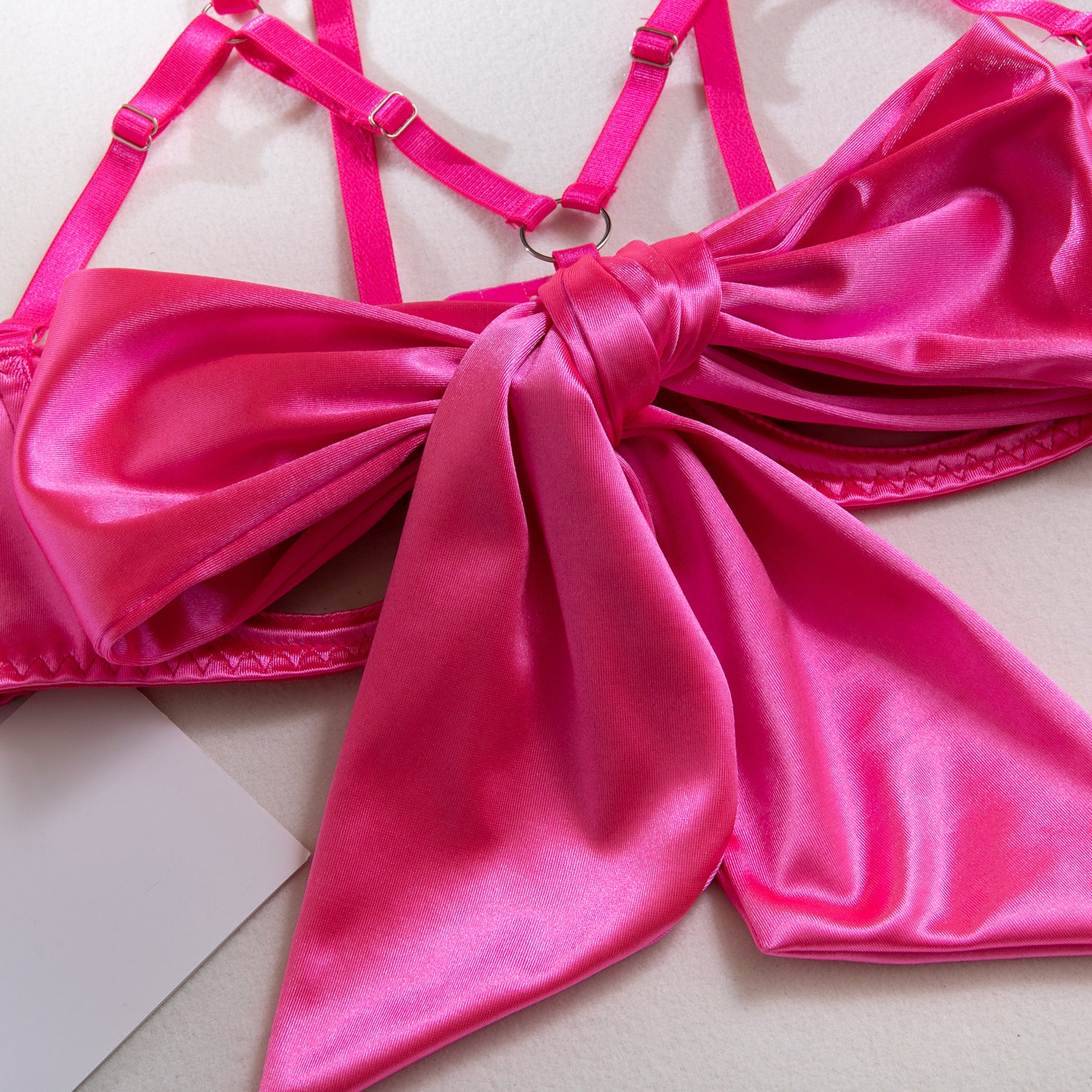 AliExpress hot-selling lingerie steel ring hollow sexy breast satin satin belt leg ring three pieces