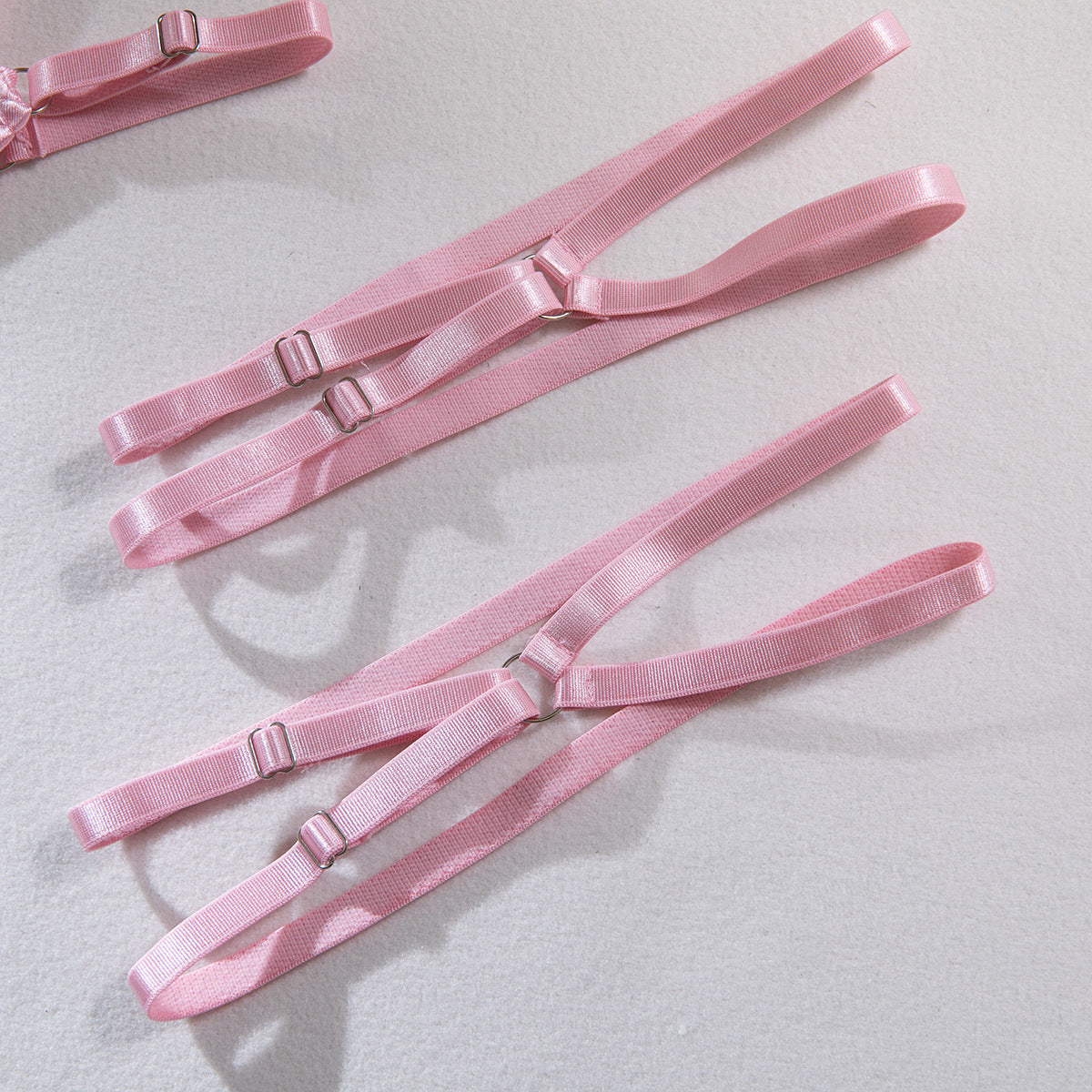 AliExpress hot-selling lingerie steel ring hollow sexy breast satin satin belt leg ring three pieces