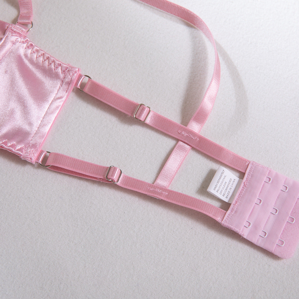 AliExpress hot-selling lingerie steel ring hollow sexy breast satin satin belt leg ring three pieces