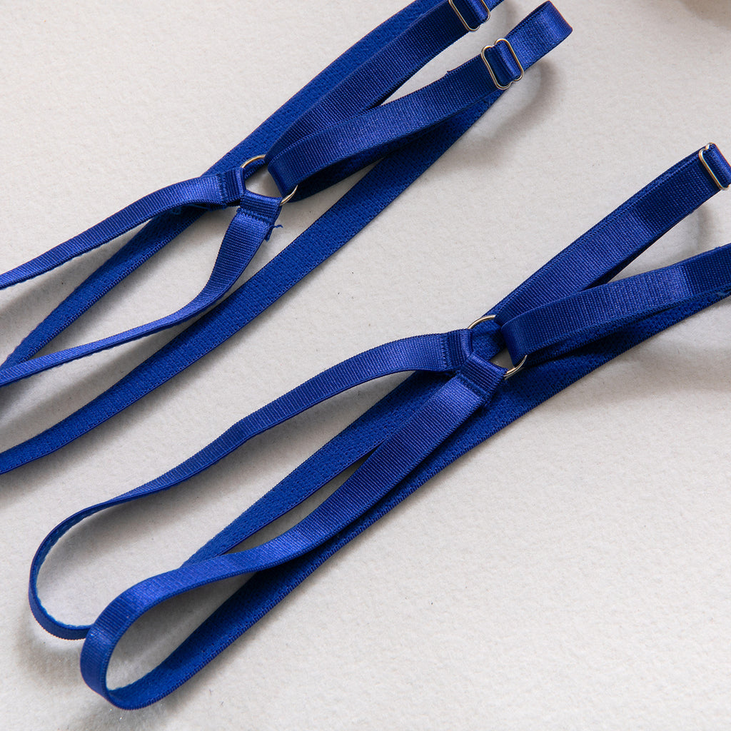 AliExpress hot-selling lingerie steel ring hollow sexy breast satin satin belt leg ring three pieces