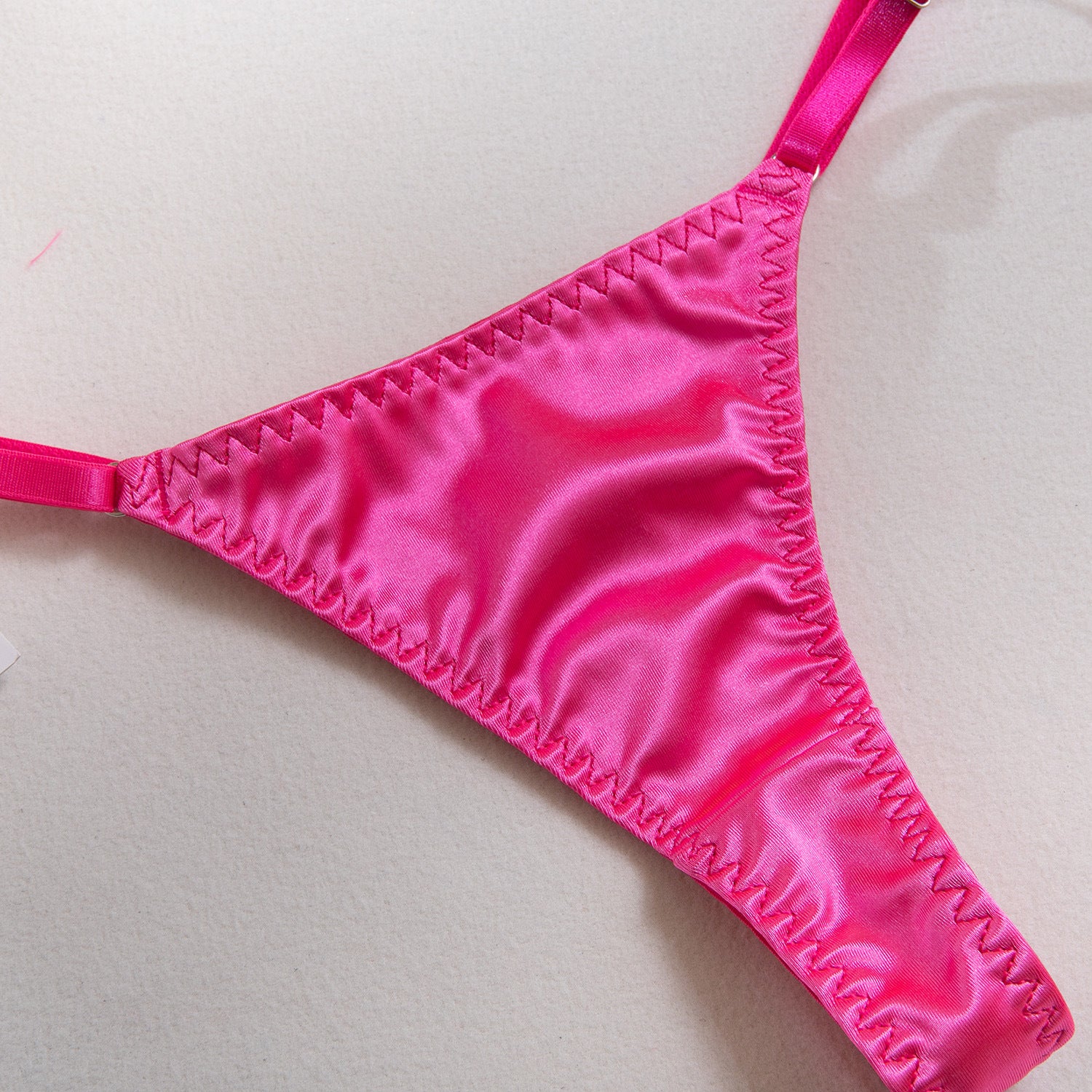 AliExpress hot-selling lingerie steel ring hollow sexy breast satin satin belt leg ring three pieces