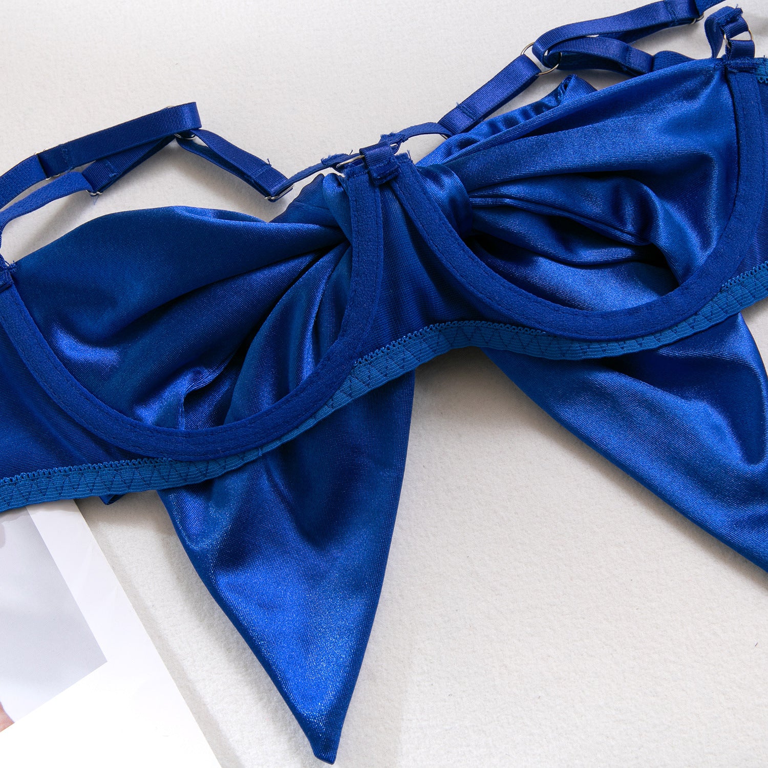 AliExpress hot-selling lingerie steel ring hollow sexy breast satin satin belt leg ring three pieces